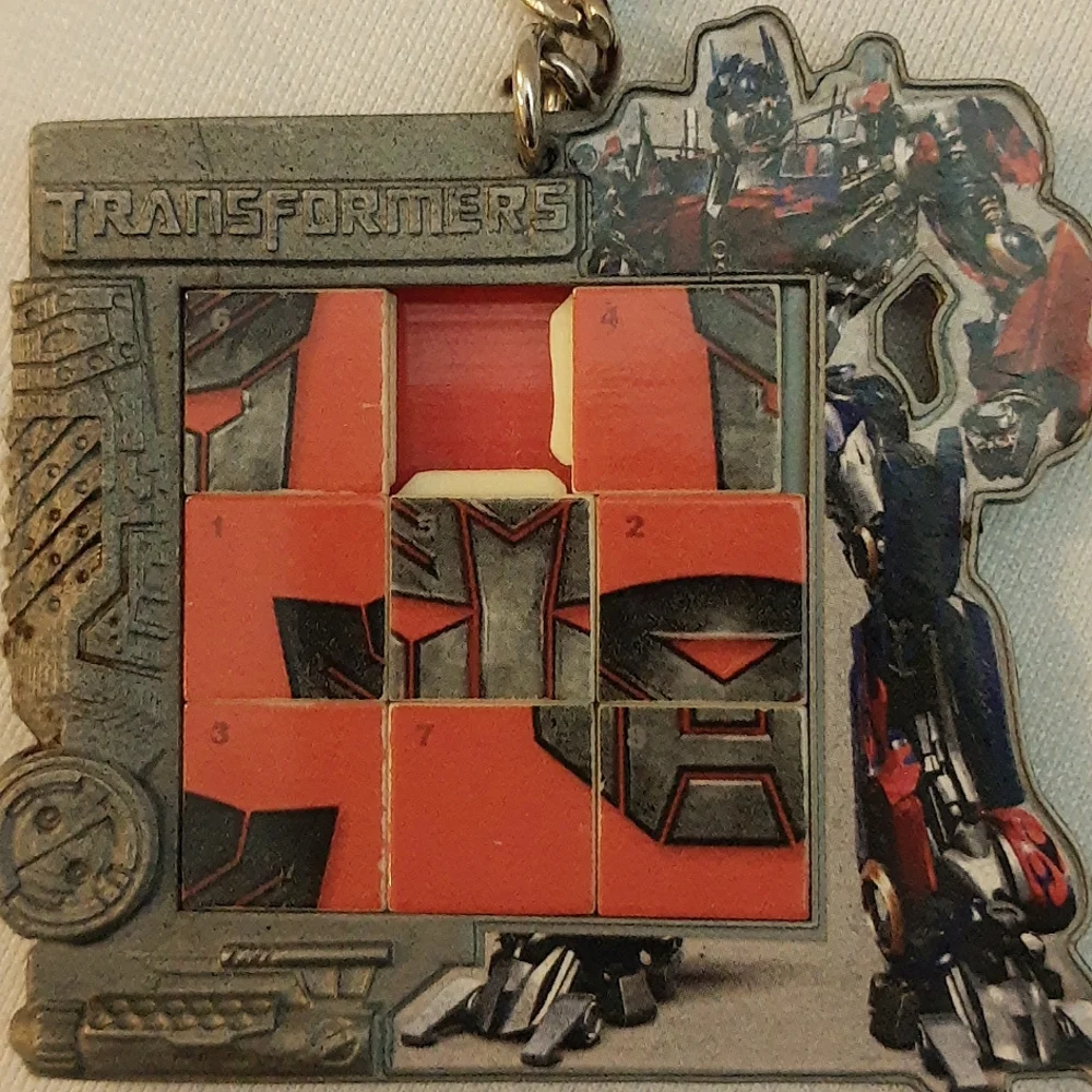 Transformers Miniature Slide Puzzle Keychain Autobot Symbol 2007